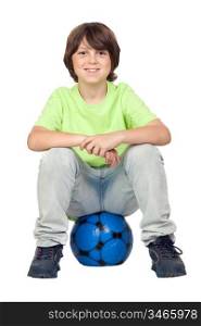 Adorable child sitting on blue soccer ball isolated on white background
