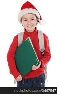 Adorable child studying with Santa Claus hat
