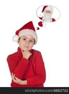 Adorable child with Christmas hat thinking in Santa Claus isolated on a white background