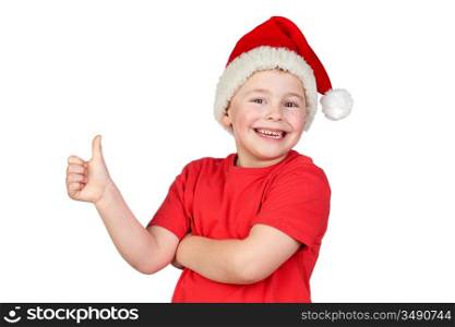 Adorable child with Santa Hat saying Ok isolated on white background