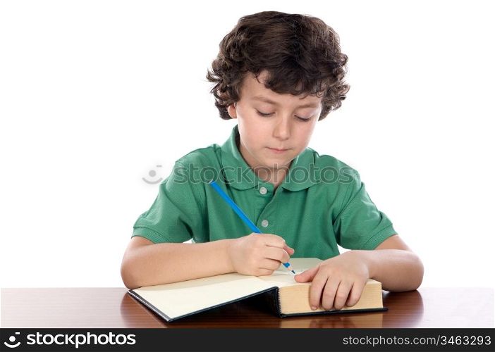 adorable child write in book a over white background