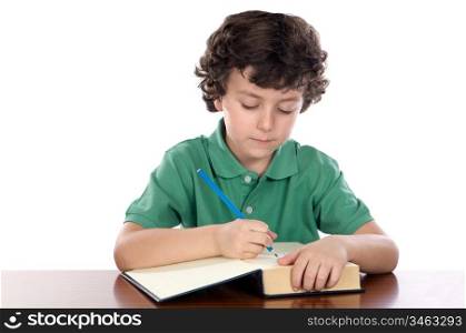 adorable child write in book a over white background