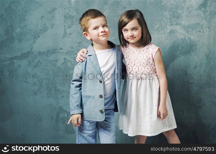 Adorable children posing and hugging