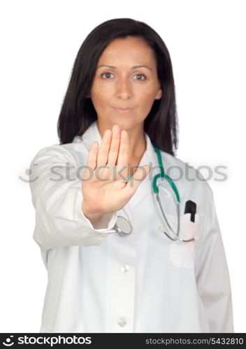 Adorable doctor saying Stop with focus on the hand isolated on white background