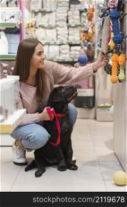 adorable dog with owner pet shop