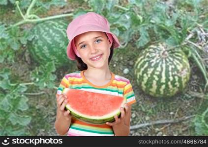 Adorable girl eating watermelon in a plantation