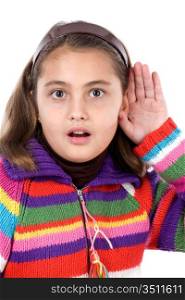 Adorable girl hearing on a over white background