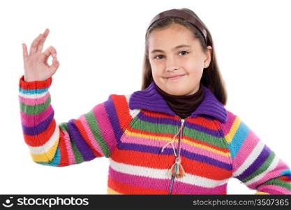 Adorable girl saying OK on a over white background