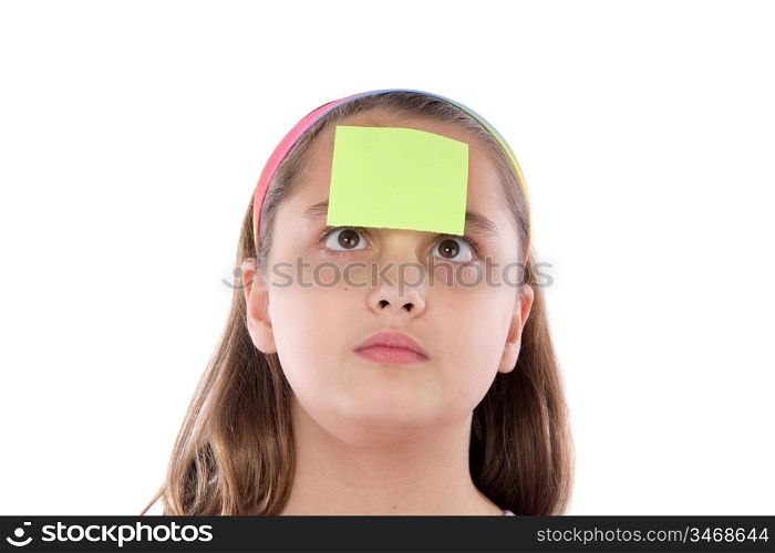 Adorable girl squint with post-it in her front isolated over white