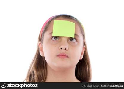 Adorable girl squint with post-it in her front isolated over white