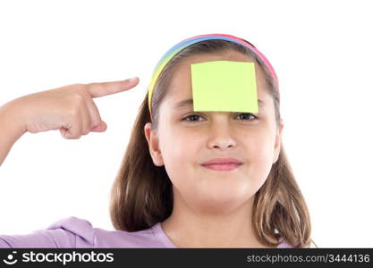 Adorable girl with a note in her front isolated over white