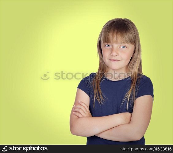 Adorable girl with blond hair on a over yellow background