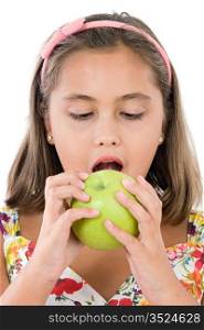 Adorable girl with flowered dress eating a apple isolated