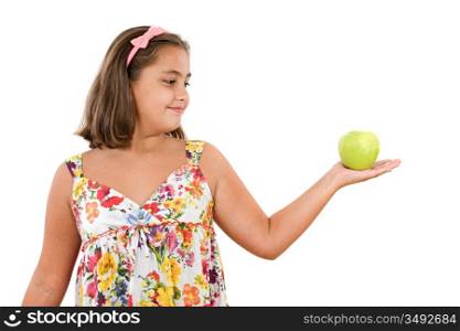 Adorable girl with flowered dress with a apple on a white background