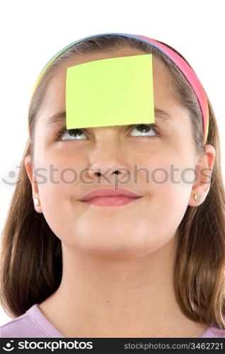 Adorable girl with post-it in her front isolated over white