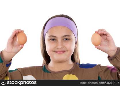 Adorable girl with two eggs on her hands on a white background