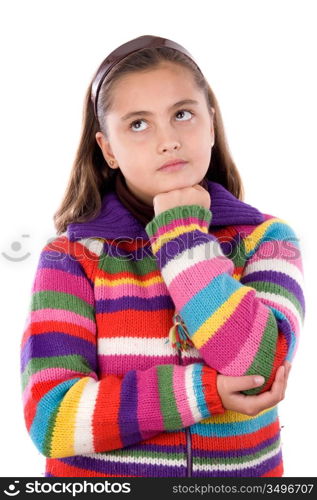 Adorable girl with woollen jacket thinking on a over white background