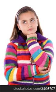 Adorable girl with woollen jacket thinking on a over white background