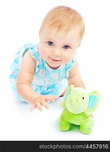 Adorable happy little baby girl, crawling and playing in the studio, isolated on white background, children day care