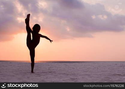 Adorable happy little girl on white beach at beautiful sunset. Adorable happy little girl on white beach at sunset.