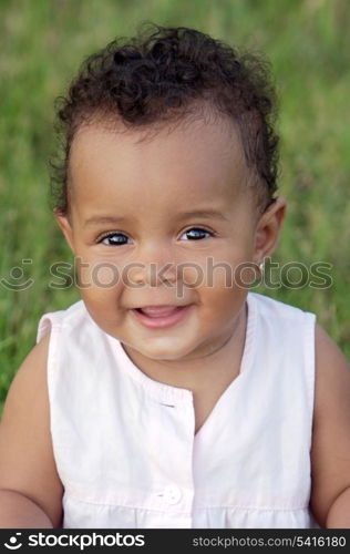 Adorable little african girl background with grass