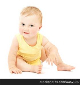 Adorable little baby girl smiling, sitting on the floor, studio shot, isolated on white background, lovely baby portrait