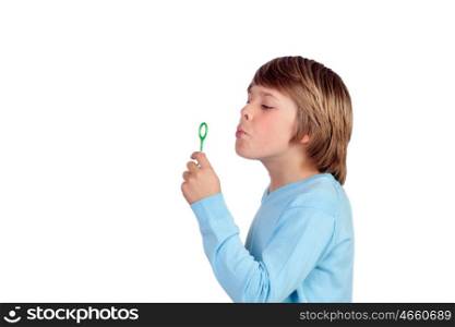 Adorable preteen boy blowing for make bubbles isolated on a over white background