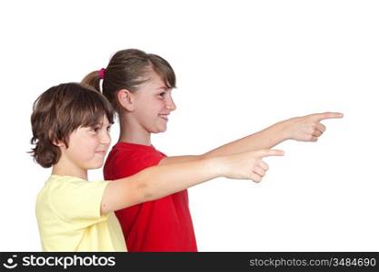 Adorable preteen girl and little boy finger pointing isolated on white background
