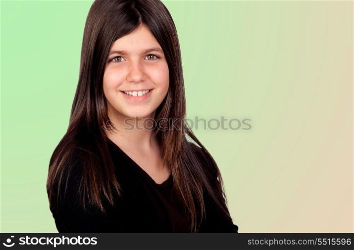 Adorable preteen girl isolated on green background