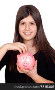 Adorable preteen girl with a piggy-bank isolated on white background