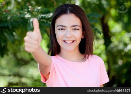 Adorable preteen girl with plants of background