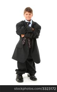 Adorable seven year old american boy in over sized suit.