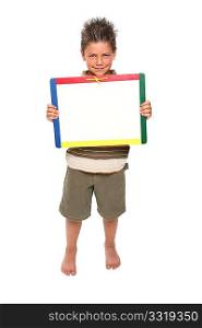 adorable seven year old boy holding blank dry erase board