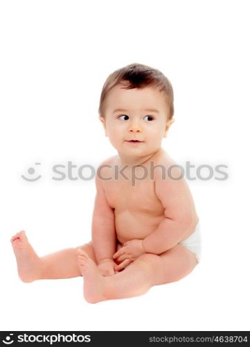 Adorable six month baby in diaper looking at side isolated on white background