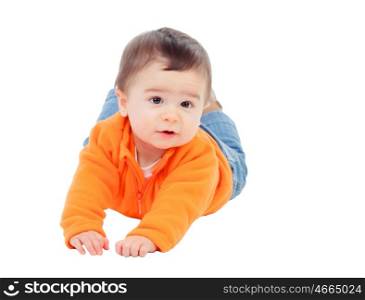 Adorable six month baby with orange jersey lying isolated on white background