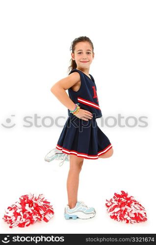 Adorable six year old french american girl cheerleader over white.