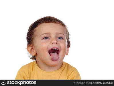Adorable small child showing his tongue isolated on a white background