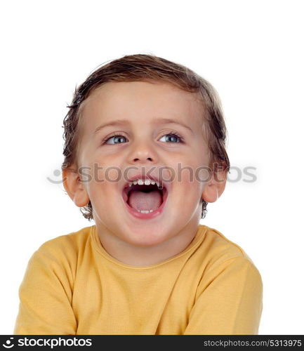 Adorable small child showing his tongue isolated on a white background