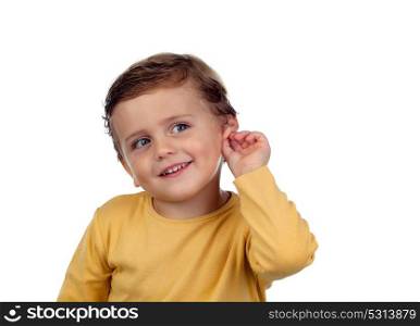 Adorable small child two years old touching his ear isolated on a white background