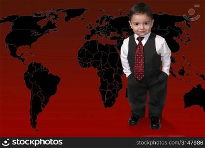 Adorable Toddler Boy In Suit Standing On The World. Hands in pocket and a sweet smile.