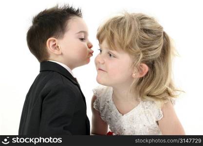 Adorable Two Year Old Boy Puckered Up To Give His Girl A Kiss.