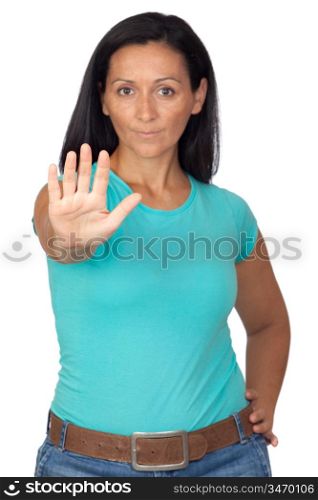 Adorable woman saying stop isolated on a over white background with focus on the hand