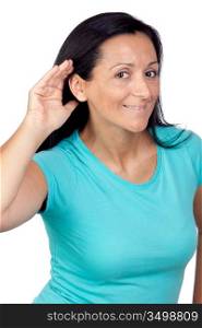 Adorable woman with blue t-shirt hearing something isolated on a over white background