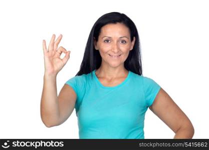 Adorable woman with blue t-shirt saying Ok isolated on a over white background