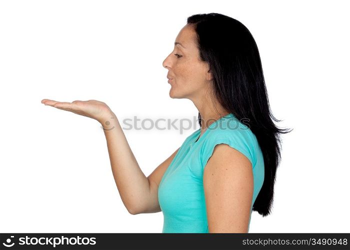 Adorable woman withaextendedapalm blowing something isolated on a over white background