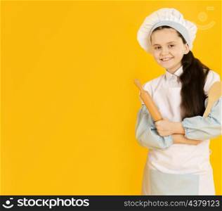 adorable young chef with copy space