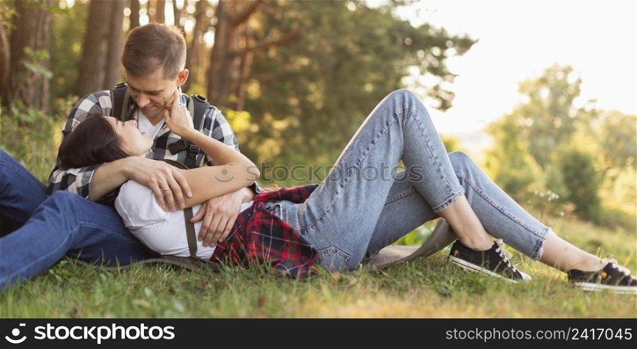 adorable young couple enjoying time nature