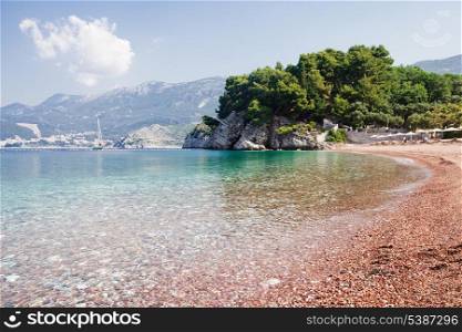 Adriatic seashore with rocks and pebble, St. Stefan, Montenegro