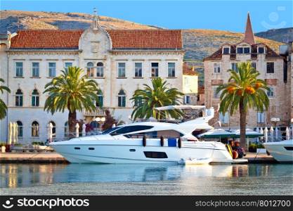 Adriatic town of Trogir seafront view, yacht and old architecture, UNESCO world heritage site