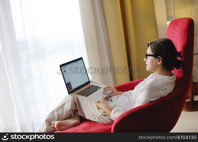 adult, beautiful, beauty, brunette, casual, caucasian, computer, couch, face, female, fun, girl, happy, home, house, indoor, indoors, interior, internet, keyboard, laptop, leisure, life, lifestyle, living, living room, modern, notebook, one, online, people, person, portrait, pretty, relax, room, smile, smiling, sofa, student, technology, typing, using, web, white, window, wireless, woman, work, young